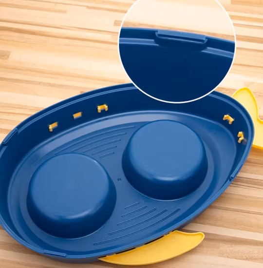 Les fabricants vendent directement en gros des produits de nettoyage pour animaux de compagnie de bol de chien d'acier inoxydable de bande dessinée